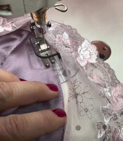 Sewing the delicate details of an EDITH piece